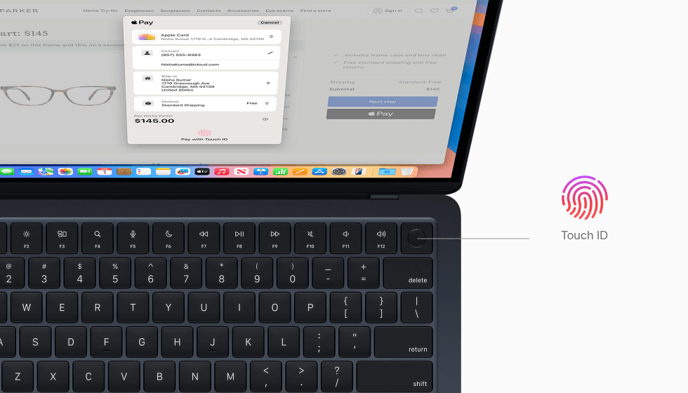 MacBook Air showing user authorizing payment for online shopping purchase using Touch ID.